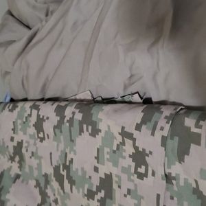 Twin size  2 piece sheet set,  top camo bottom tan sheets